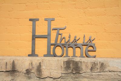This is Home Metal Word Sign - Madison Iron and Wood - Metal Art - metal outdoor decor - Steel deocrations - american made products - veteran owned business products - fencing decorations - fencing supplies - custom wall decorations - personalized wall signs - steel - decorative post caps - steel post caps - metal post caps - brackets - structural brackets - home improvement - easter - easter decorations - easter gift - easter yard decor