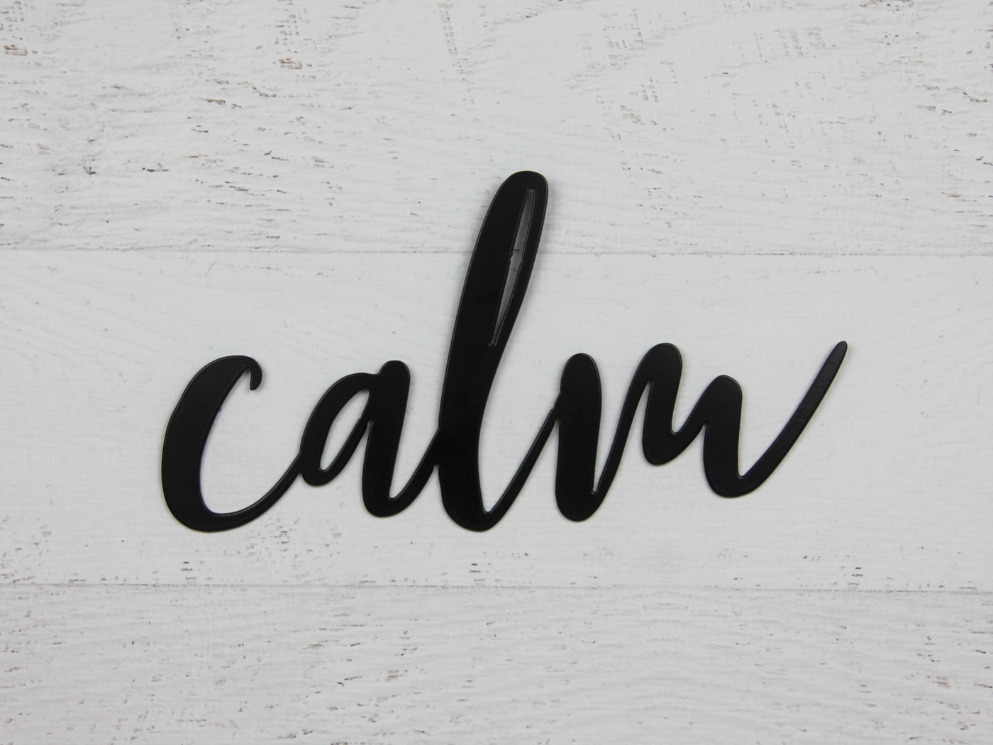 Calm Metal Word Sign - Madison Iron and Wood - Wall Art - metal outdoor decor - Steel deocrations - american made products - veteran owned business products - fencing decorations - fencing supplies - custom wall decorations - personalized wall signs - steel - decorative post caps - steel post caps - metal post caps - brackets - structural brackets - home improvement - easter - easter decorations - easter gift - easter yard decor