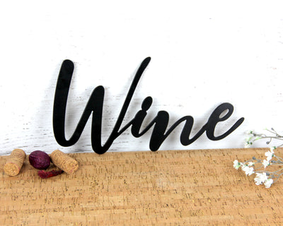 Wine Metal Word Sign - Madison Iron and Wood - Wall Art - metal outdoor decor - Steel deocrations - american made products - veteran owned business products - fencing decorations - fencing supplies - custom wall decorations - personalized wall signs - steel - decorative post caps - steel post caps - metal post caps - brackets - structural brackets - home improvement - easter - easter decorations - easter gift - easter yard decor