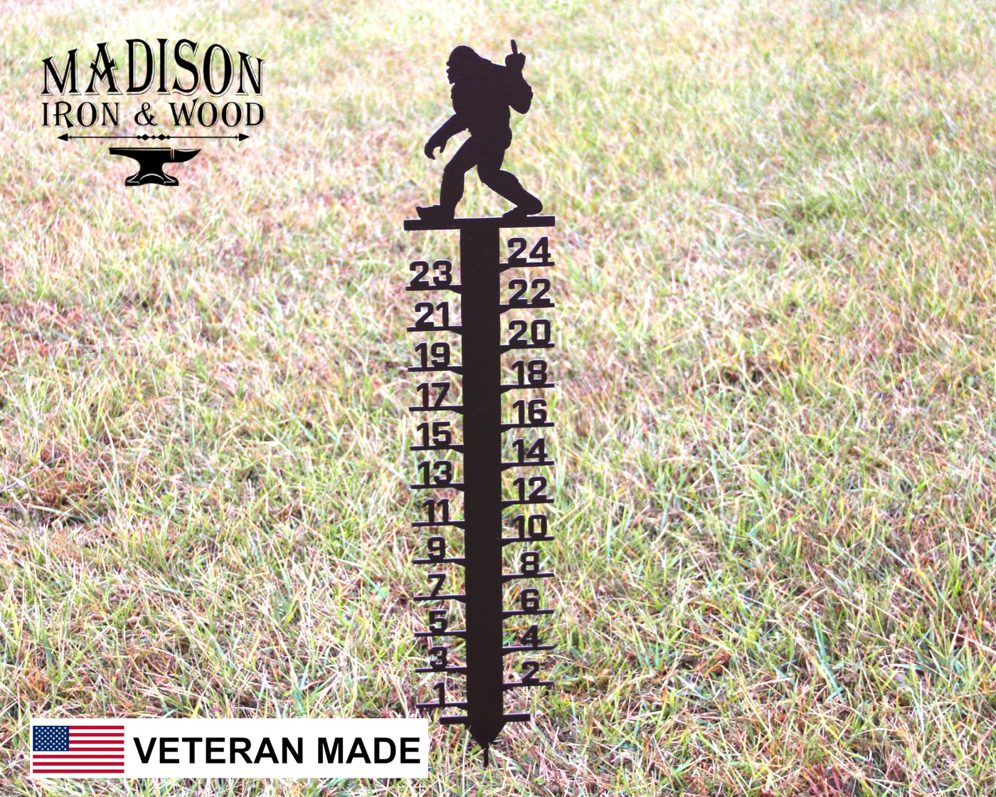 Bigfoot Middle Finger Snow Gauge - Madison Iron and Wood - Snow Gauge - metal outdoor decor - Steel deocrations - american made products - veteran owned business products - fencing decorations - fencing supplies - custom wall decorations - personalized wall signs - steel - decorative post caps - steel post caps - metal post caps - brackets - structural brackets - home improvement - easter - easter decorations - easter gift - easter yard decor